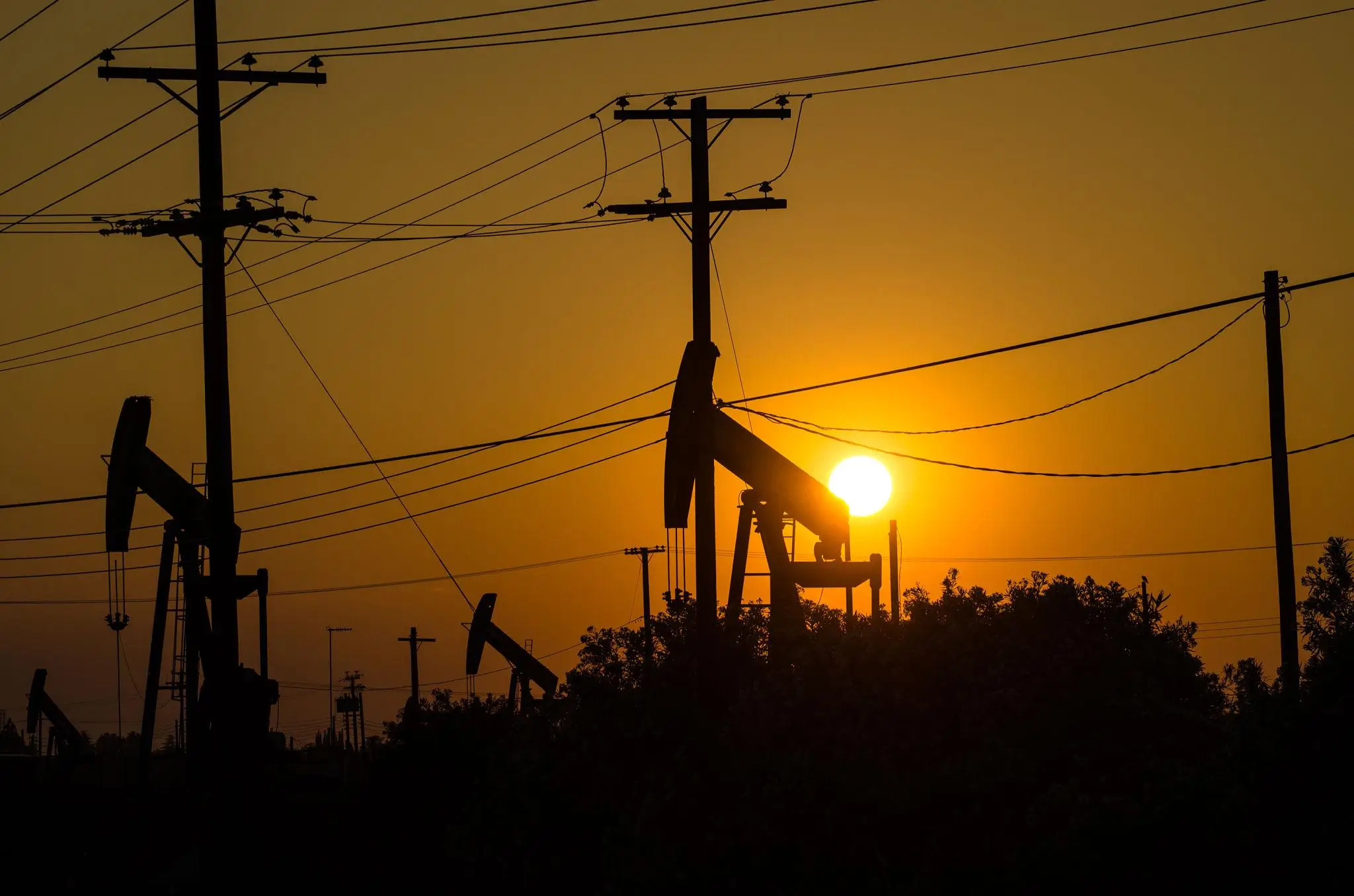 Oil pumps symbolizing rising petrol prices due to Iran Israel war