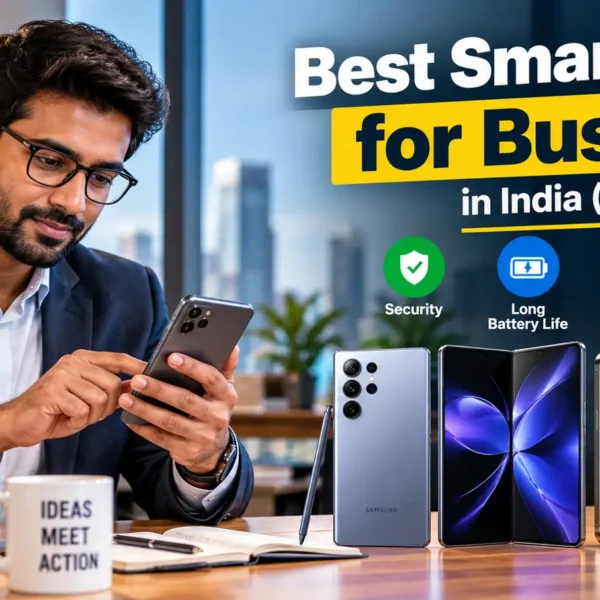 Indian professional using a smartphone while working at an office desk